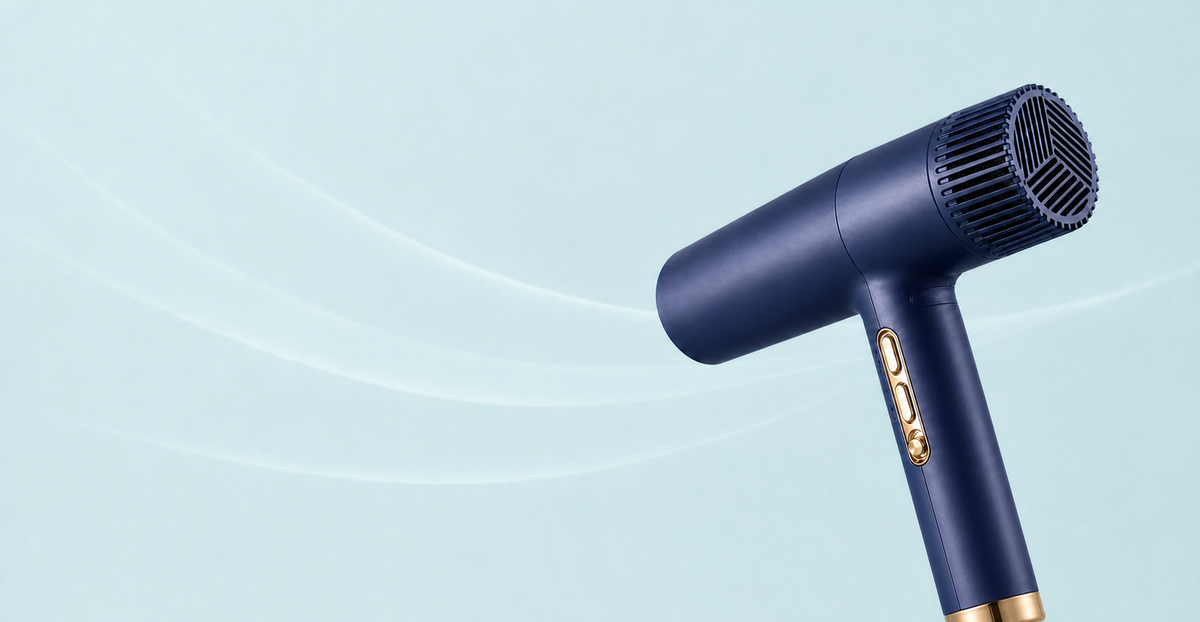 Premium close angled view of the navy Orien compact hair dryer with elongated handle